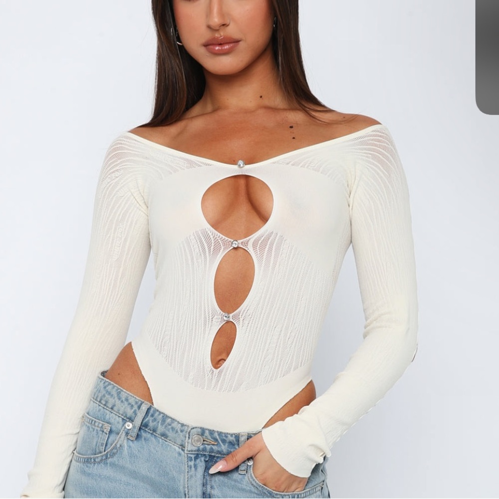 White fox “ none of your concern “ bodysuit